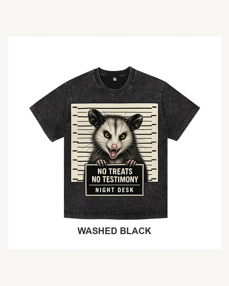 Complete washed black T-shirt featuring No Treats Opossum Night Desk T-shirt