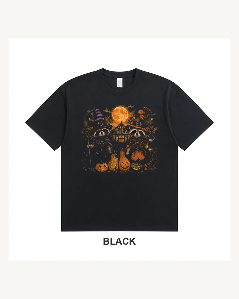 Black T-shirt with two raccoon witches, four gourds and a moonlit greenhouse
