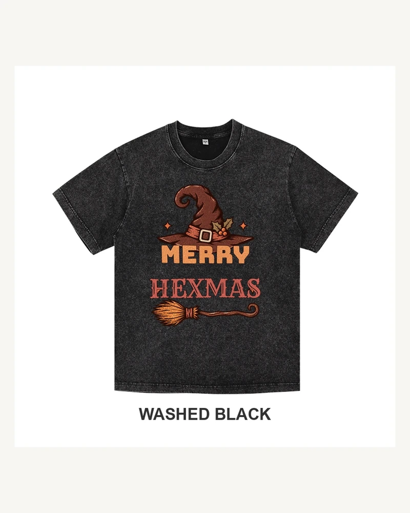 Black cotton T-shirt with Merry Hexmas witch hat and broom graphic
