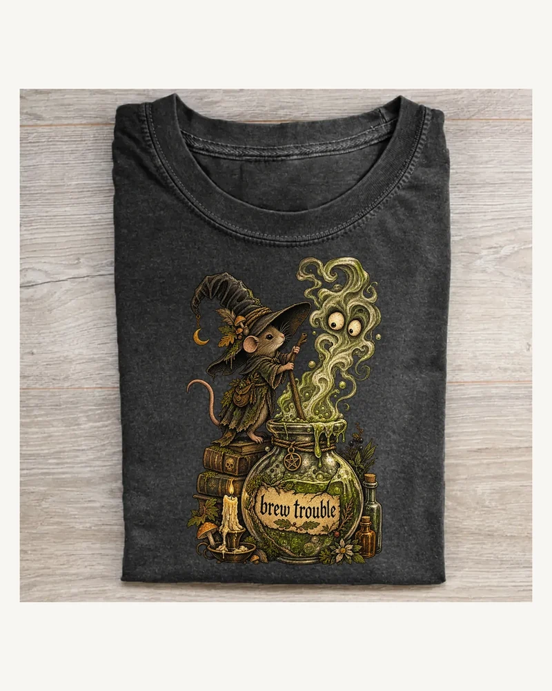 Folded washed black T-shirt featuring Brew Trouble gothic artwork