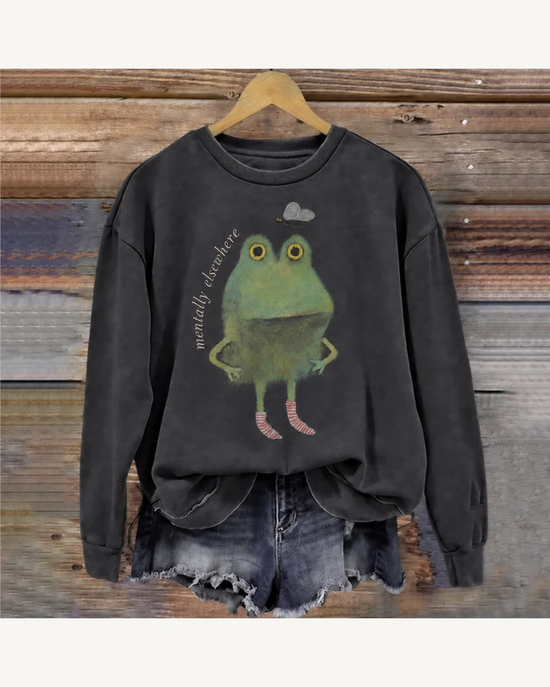 Black crewneck sweatshirt featuring Mentally Elsewhere Frog Sweatshirt