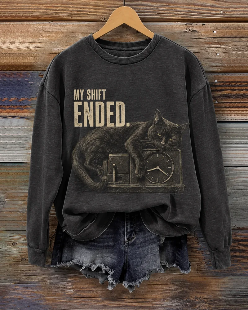 My Shift Ended Black Cat Sweatshirt: charcoal crewneck sweatshirt on a wooden hanger with vintage-style animal artwork