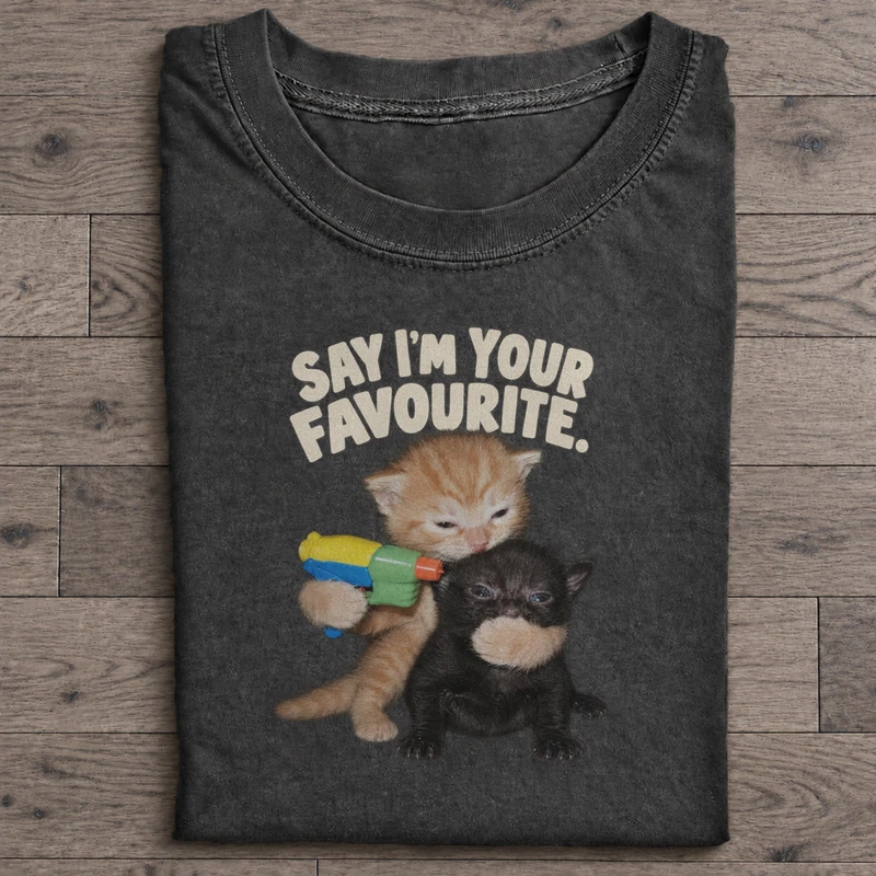Say Im Your Favourite Graphic T-Shirt on washed-black cotton T-shirt