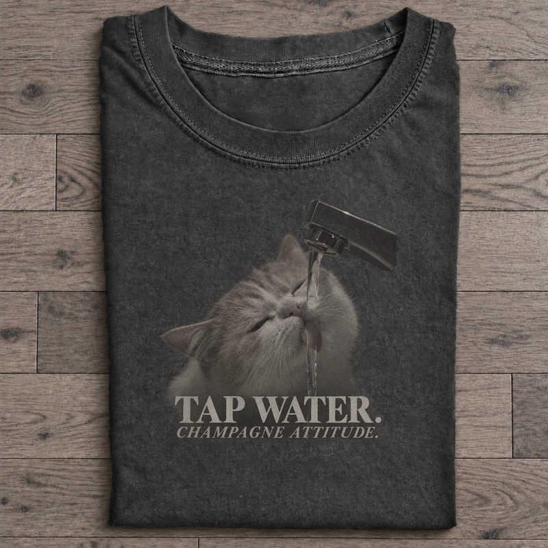 Tap Water Champagne Attitude Graphic T-Shirt on washed-black cotton T-shirt