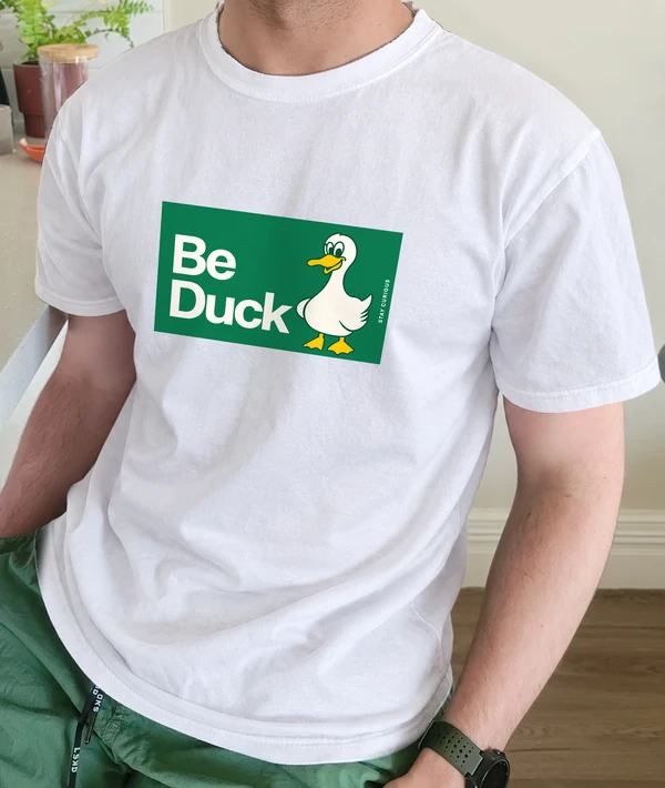 Be Duck Stay Curious Graphic T-Shirt — AI-edited styling illustration